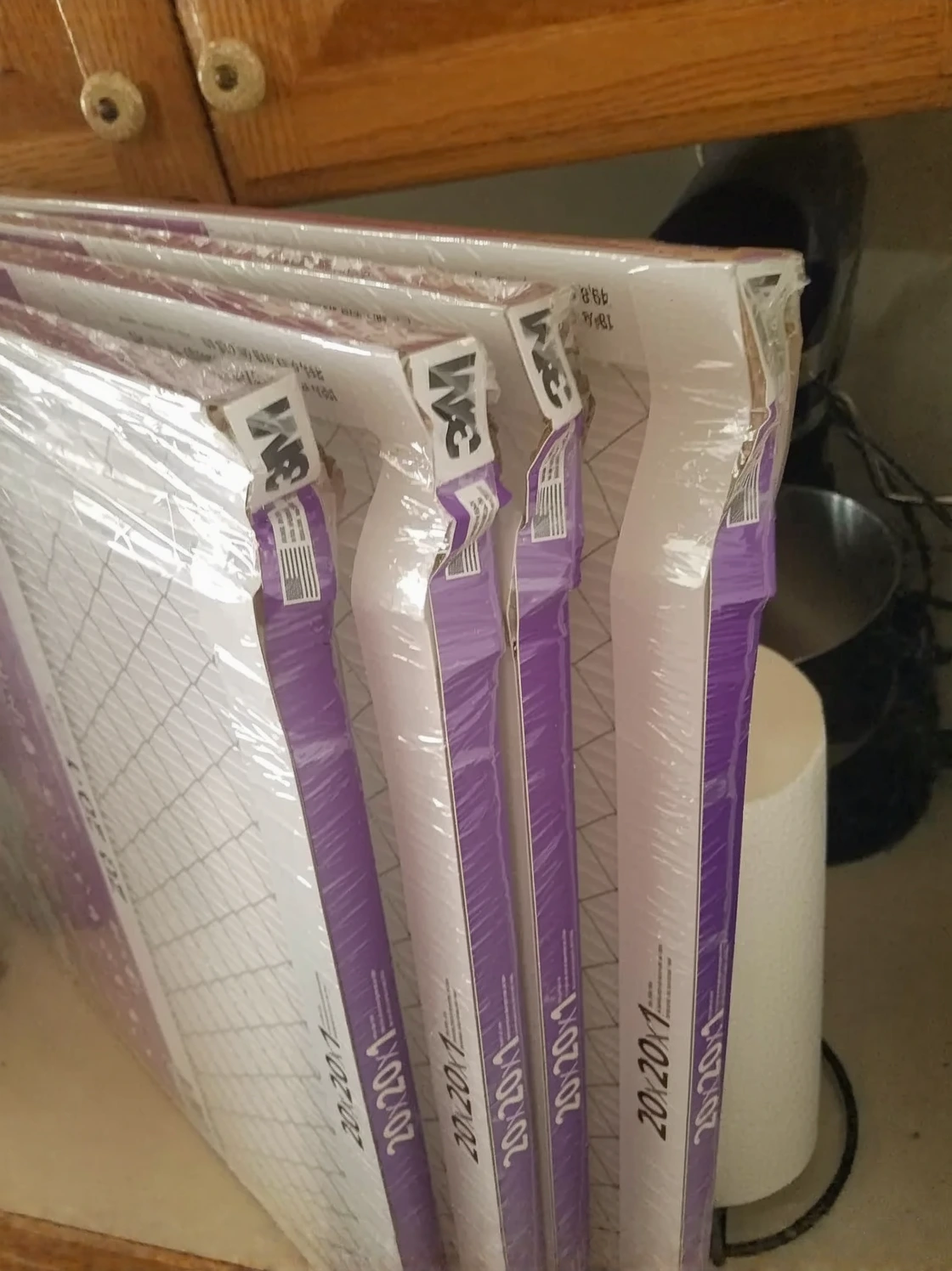 Customer photo of MERV 8 air filter held up showing thickness and filter material construction