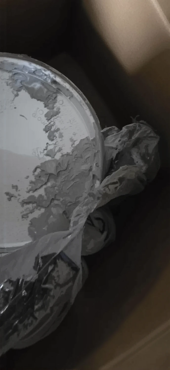 Customer photo showing duct mastic sealant applied to ductwork seams during testing