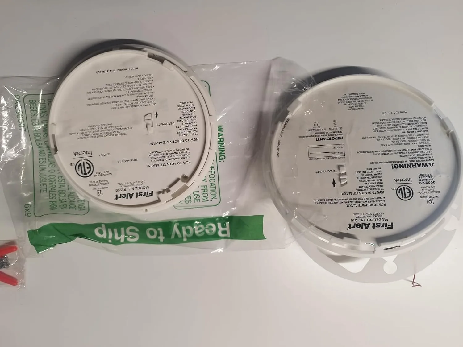 Customer photo of combination smoke and CO detector mounted on ceiling