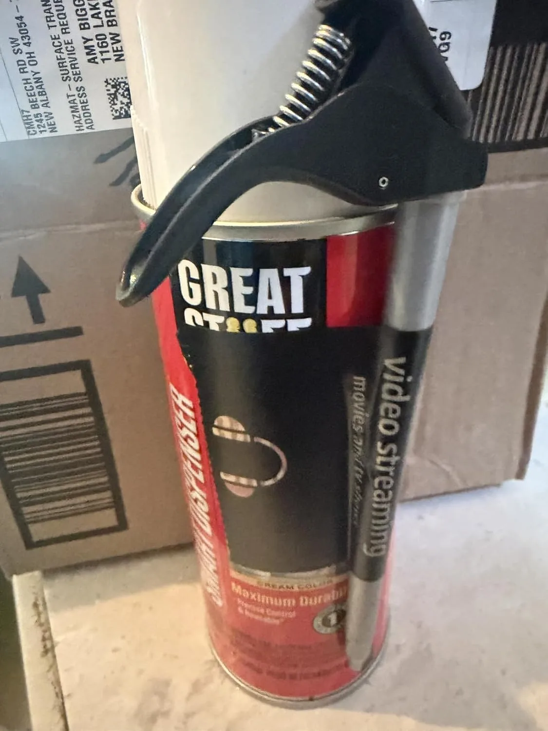 Customer photo showing air sealing materials and caulk applied around window frames before insulation installation