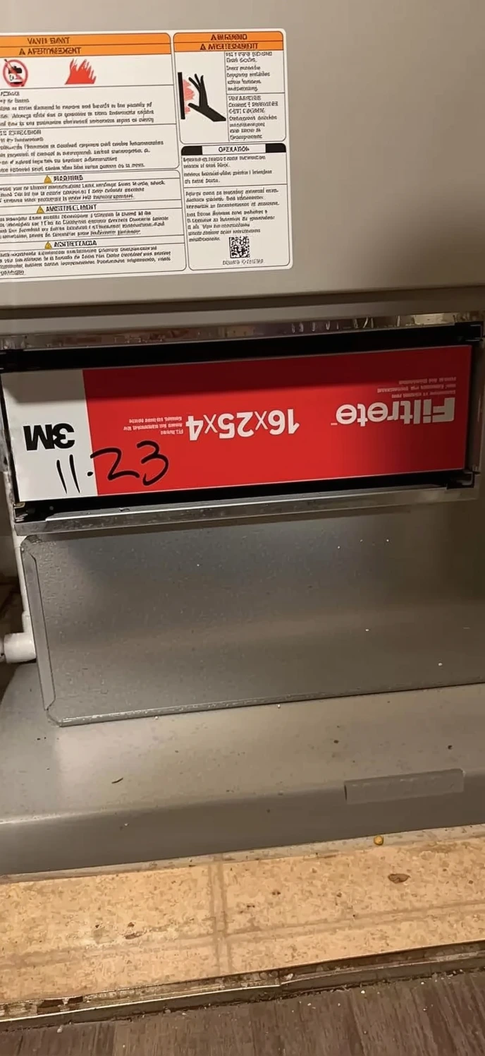 Customer photo of furnace thermostat display showing cycling frequency diagnostics