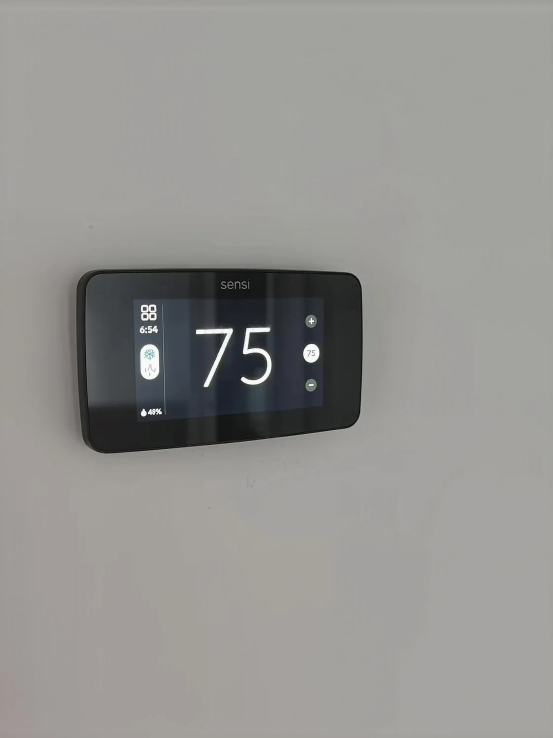 Customer photo showing thermostat C-wire installation setup with wiring diagram