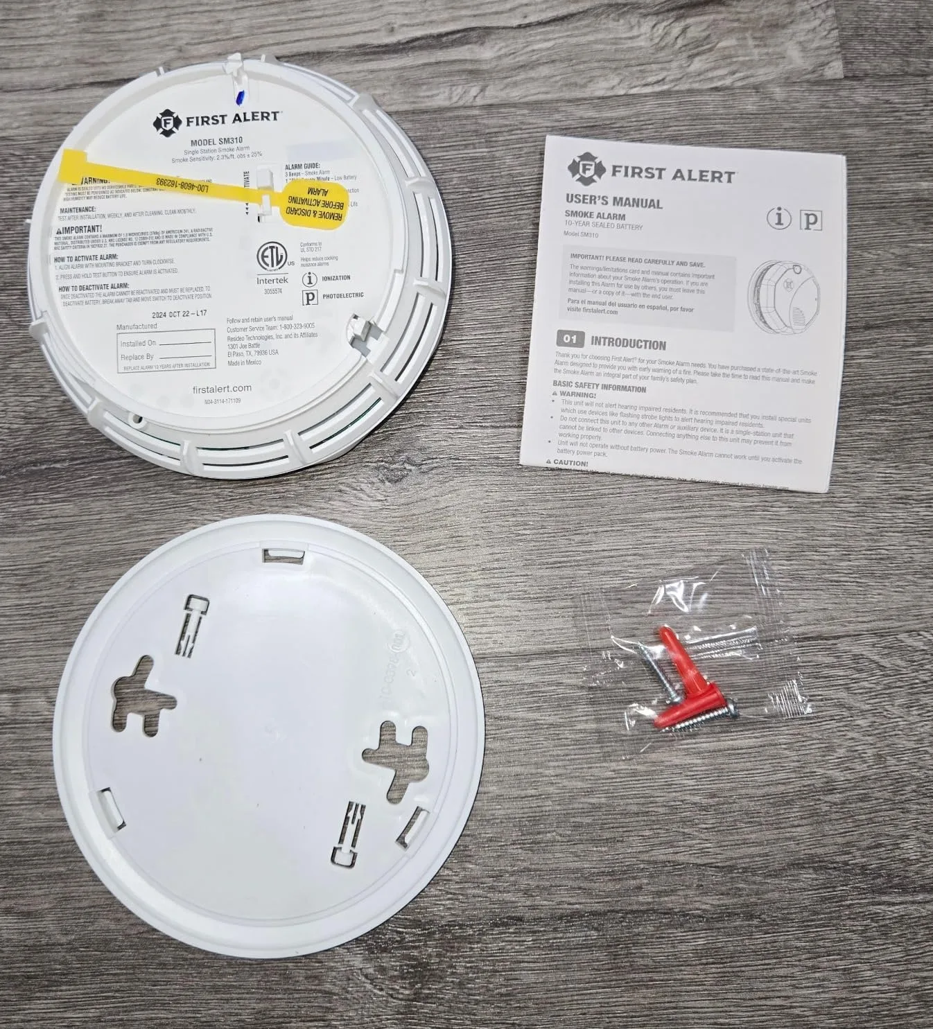 Customer photo of smoke detector mounted on ceiling showing installation and placement